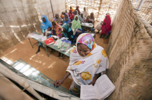 A view inside Abu Shouk Internally Displaced Persons (IDP) Camp's Women Center, in North Darfur, Sudan, where classes are offered in Arabic, the Koran and Mathematics. Approximately 80 women attend the classes, usually taking their children along with them.